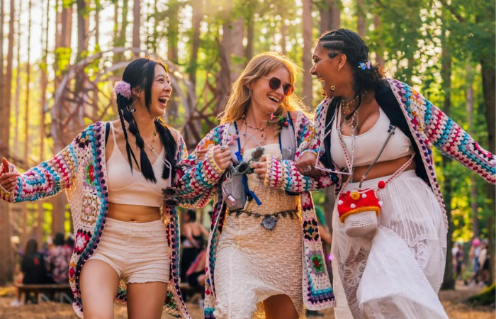 attendees frolicking through the forest
