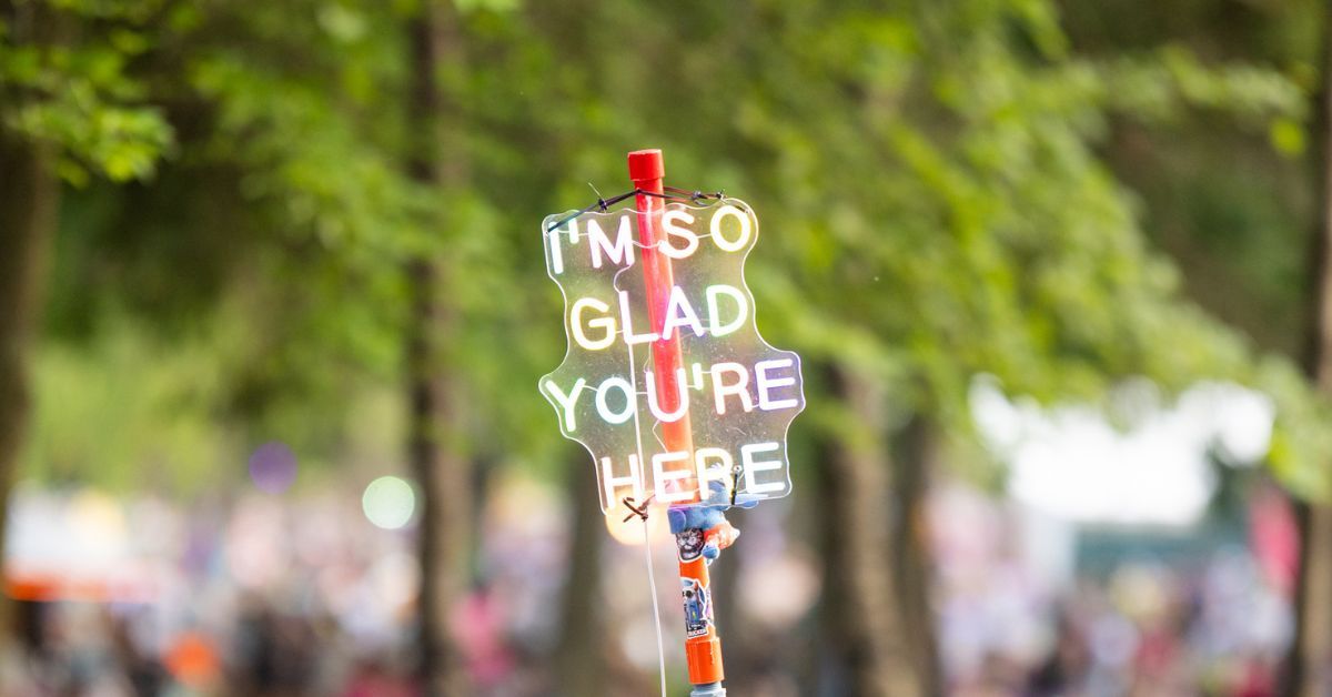 "I'm so glad you're here" totem